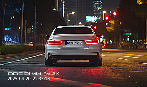 DDPAI MINI Pro 2K superior night vision footage showing a clear rear view of a car