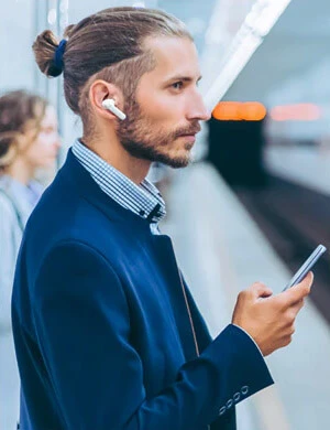 Haylou MoriPods ANC in a man's ear